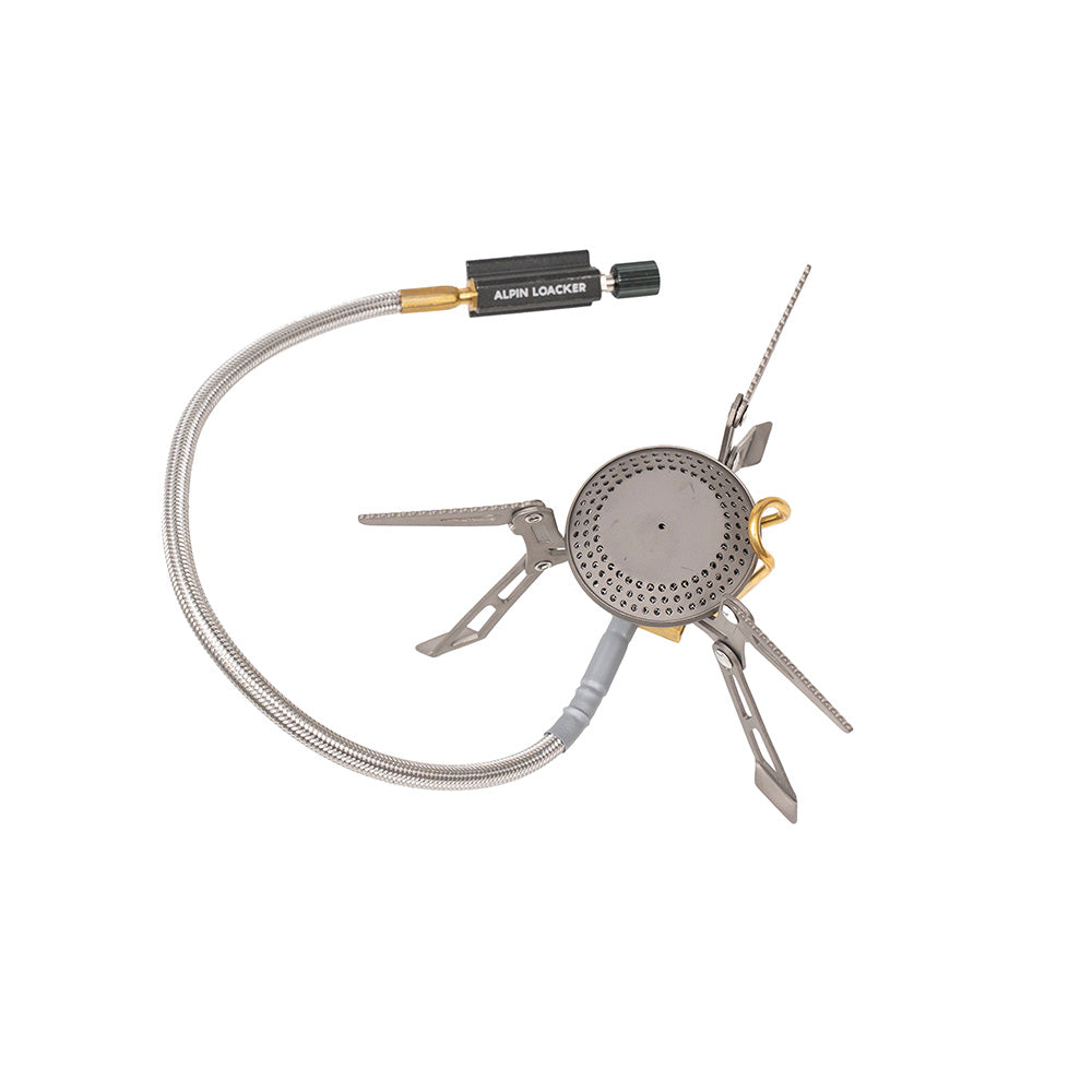 Leichter stabiler Performance Gaskocher aus Titan mit einklappbaren Beinen, flexiblem Gasschlauch und ALPIN LOCKER Ventil, ideal für Outdoor-Abenteuer und effizientes Kochen.
