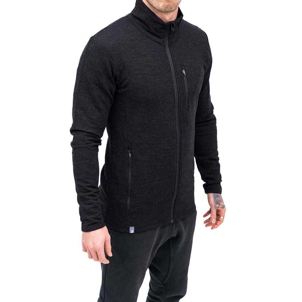 Merino Jacke Herren 270 g/m²: Slim-fit schwarze Jacke mit Stehkragen und Reißverschlusstaschen, ideal für Outdoor-Abenteuer und täglichen Komfort.