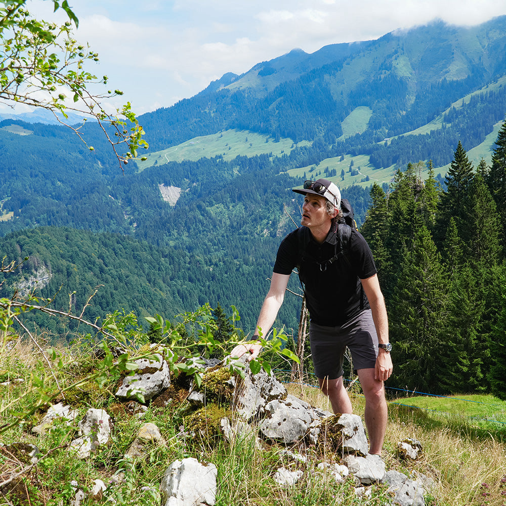 Alpine Loacker, maglietta merino da uomo con taglio polo in nero