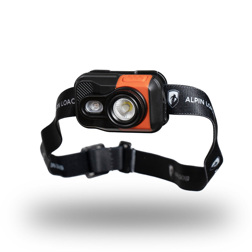 Lampe frontale LED légère de 700 lumens avec bandeau réglable, idéale pour les aventures en plein air comme le camping et la randonnée. Ultralégère, résistante aux intempéries et alimentée par des piles.