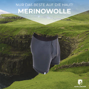 Merino Boxershorts Herren 150 g/m² auf grünem Hügel, ideal für Outdoor-Aktivitäten, vereint Komfort und Funktionalität mit CORESPUN-Technologie, atmungsaktiv und geruchsneutral.